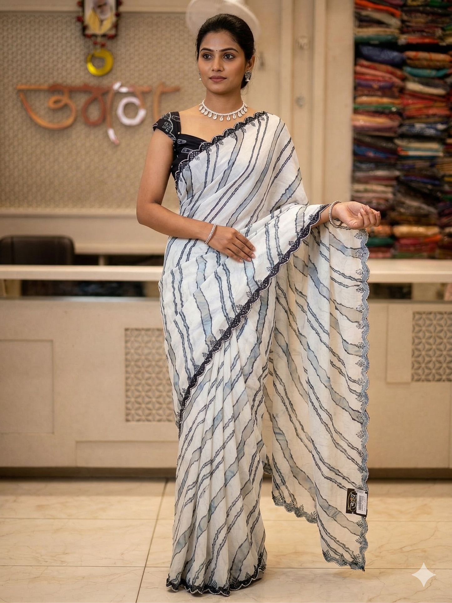 white saree with black border